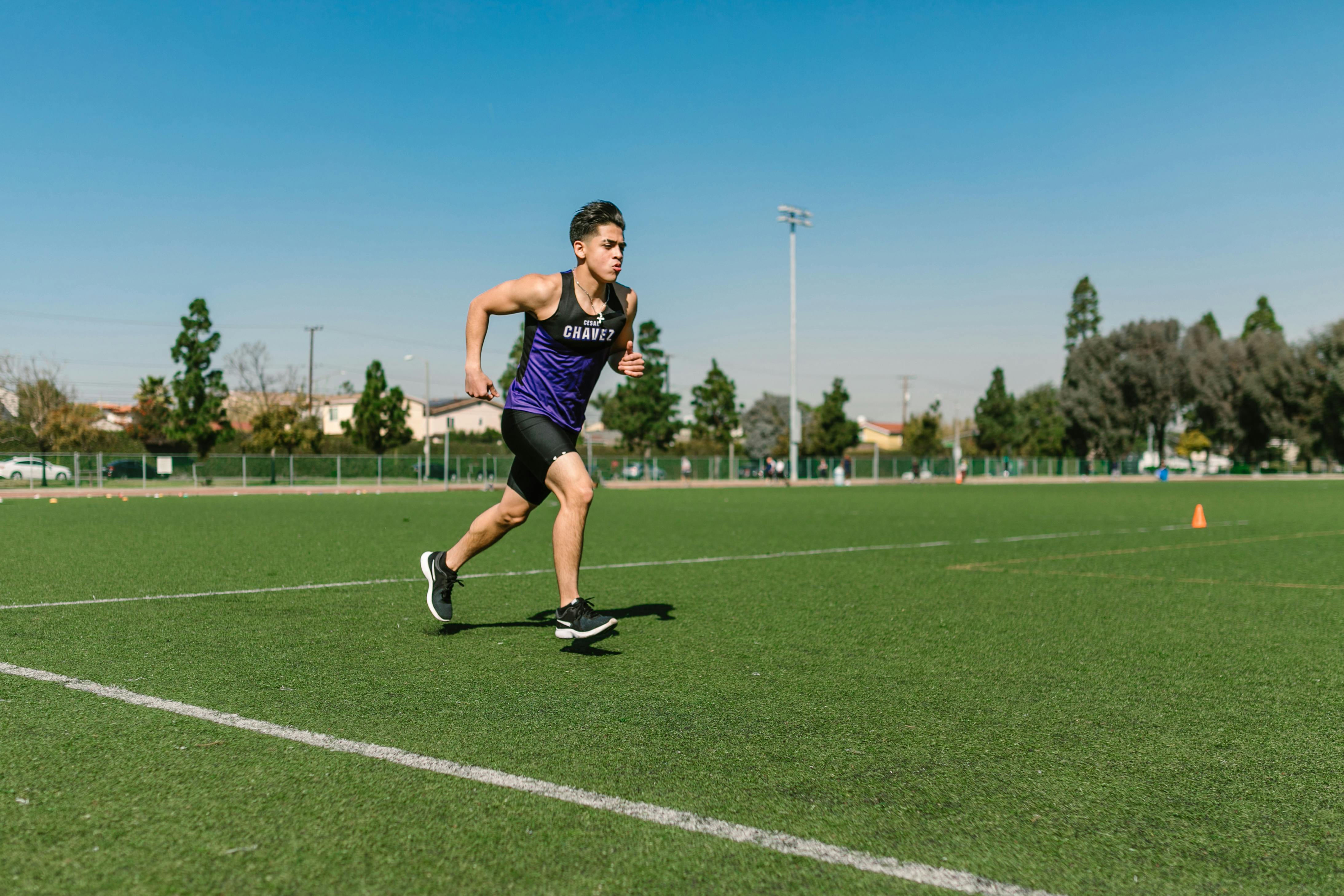 Young athlete celebrating return to sport after rehabilitation