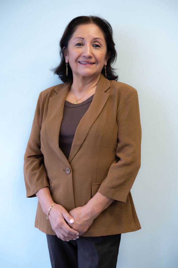 Lourdes Godomar — Founder & Administrative Director